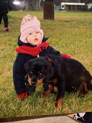 Moi petite avec le chien de mesparentd